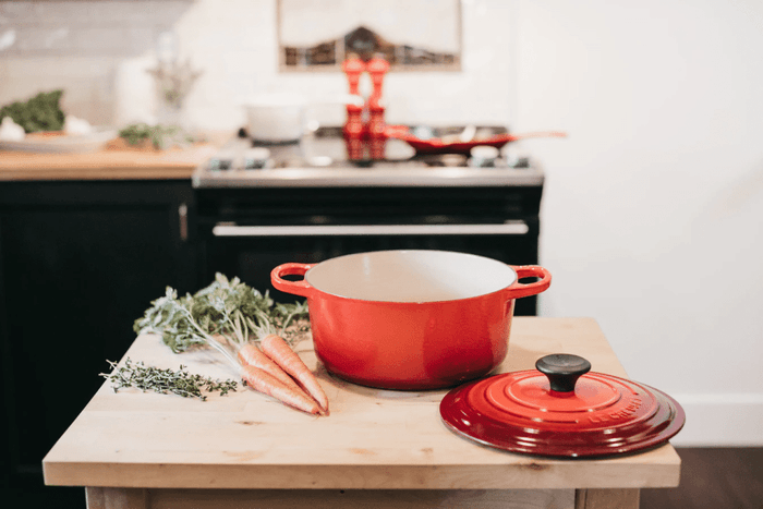 Carrots being prepared for a dutch oven